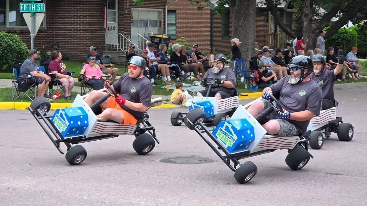 Minnesota Kids Foundation parade carts participating in a community parade